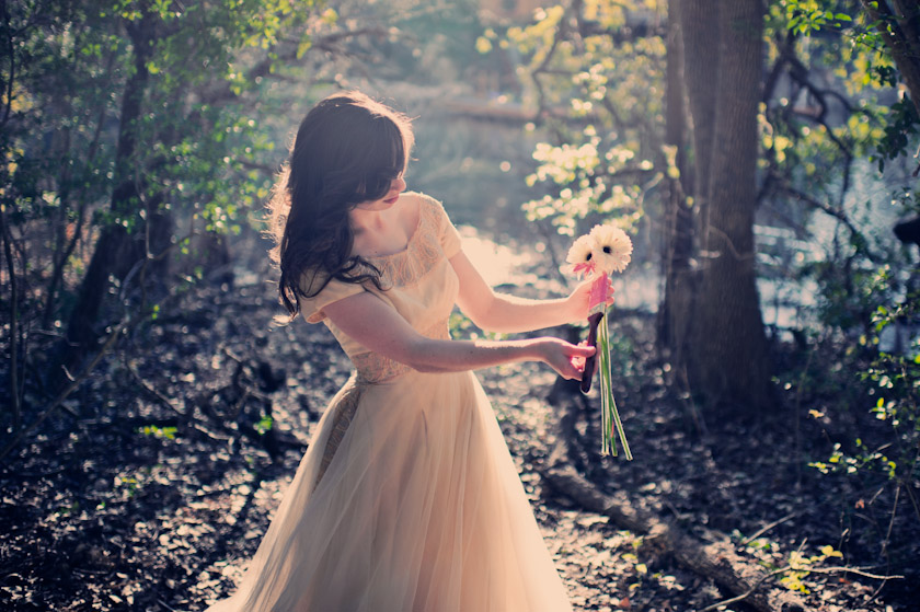 bride painting white flowers pink