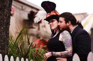 quirky couple embracing at spiderhouse cafe