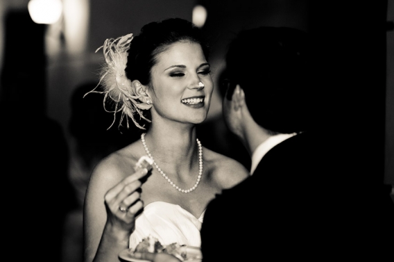 groom laughing at the cake on her nose during austin wedding photography