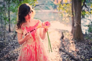 at a rock the dress session outdoors in sunset