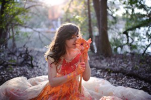 bride sniffling flowers