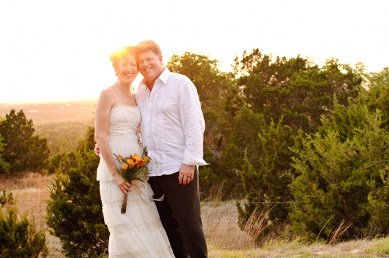 couple laughing at sunset