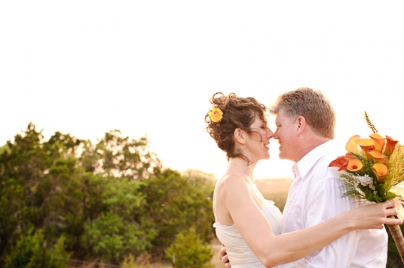 bride and groom facing each other