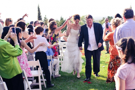 lavender being thrown at the bride and groom
