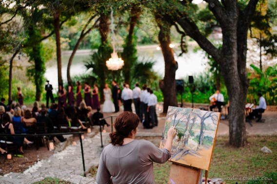 a painter painting the wedding ceremony