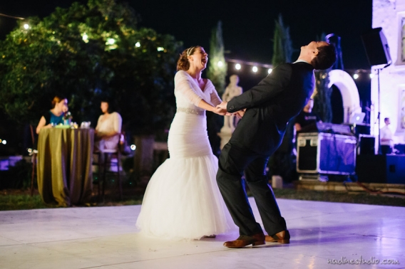 bride and groom dancing