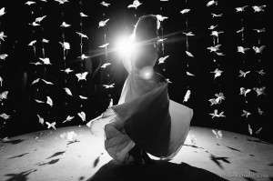 bride dancing in front of neiman marcus butterfly streamers