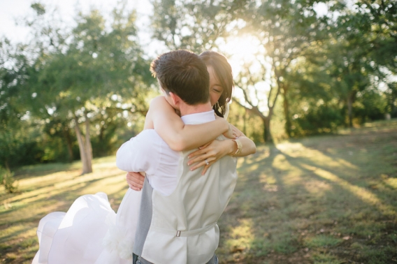 groom lifting bride flying