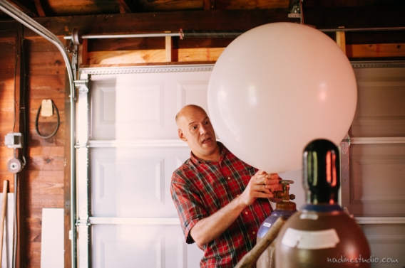 blowing up a helium balloon