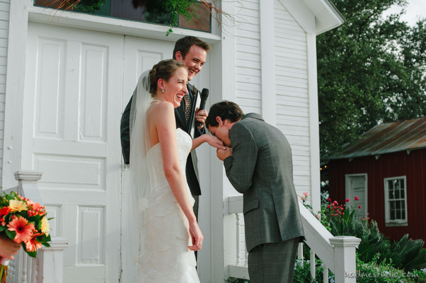 groom kissing bride