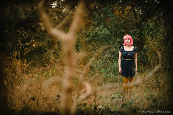 pink haired girl in a park