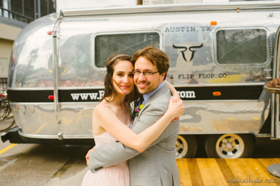 rickshaw boots downtown austin airstream trailer, wedding couple in front