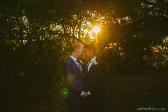 a gay couple with the sunlight and sun rays