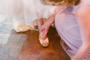 putting shoes on