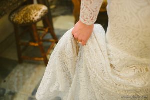 bride holding dress