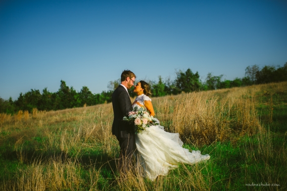 bride and groom in a field in round rock, tx