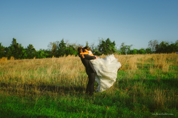 bride and groom in a field in brenham, tx