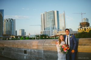 bride and groom with view of power plant