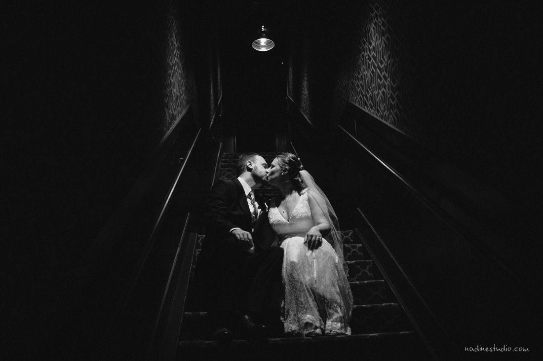 romantic alamo drafthouse highball wedding black and white in stair well