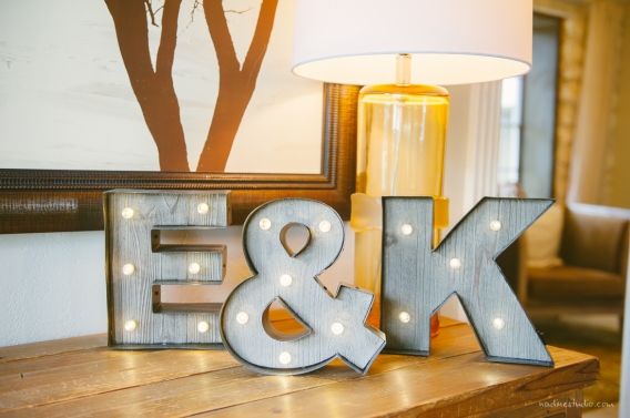 initials E and K lit up with lights