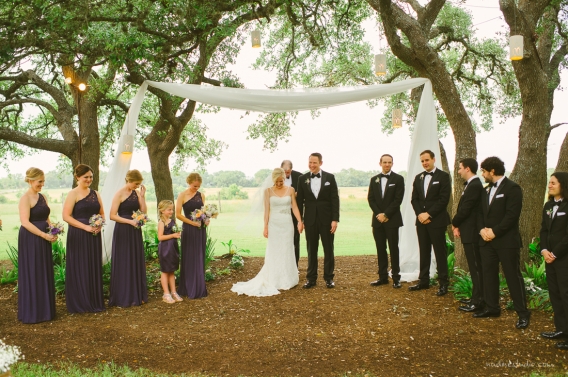 fabric canopy among oak trees ceremony