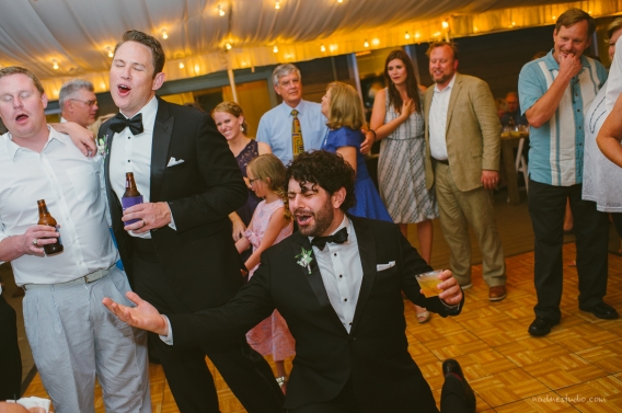groomsman serenading the bride