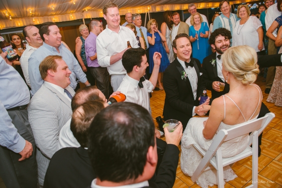 groomsmen singing to the bride