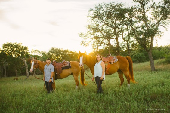 couple with horses at sunset