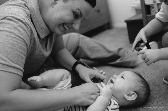 mama tickling child