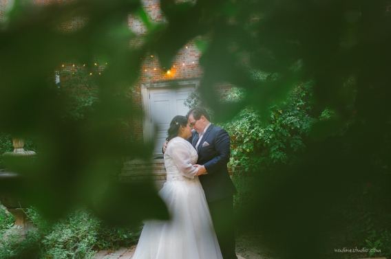 bride and groom portraits at the garden of the texas women federated mansion