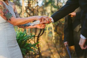 holding hands during ceremony