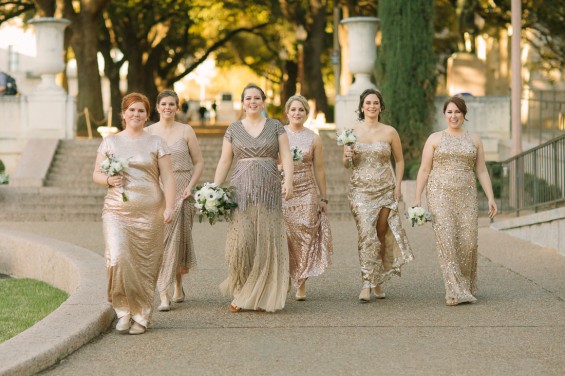 bridesmaids in gold walking down the UT quad for UT bridesmaids pictures