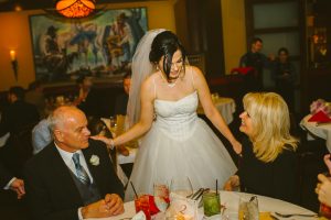 bride and father of the bride at the reception at estancia churrascaria