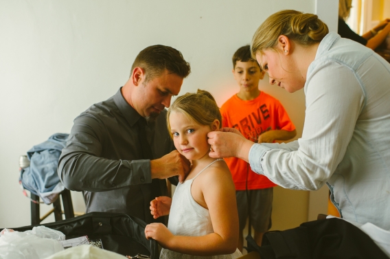 getting the flower girl ready