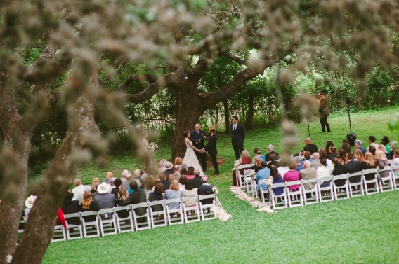 winfield inn wedding ceremony under trees